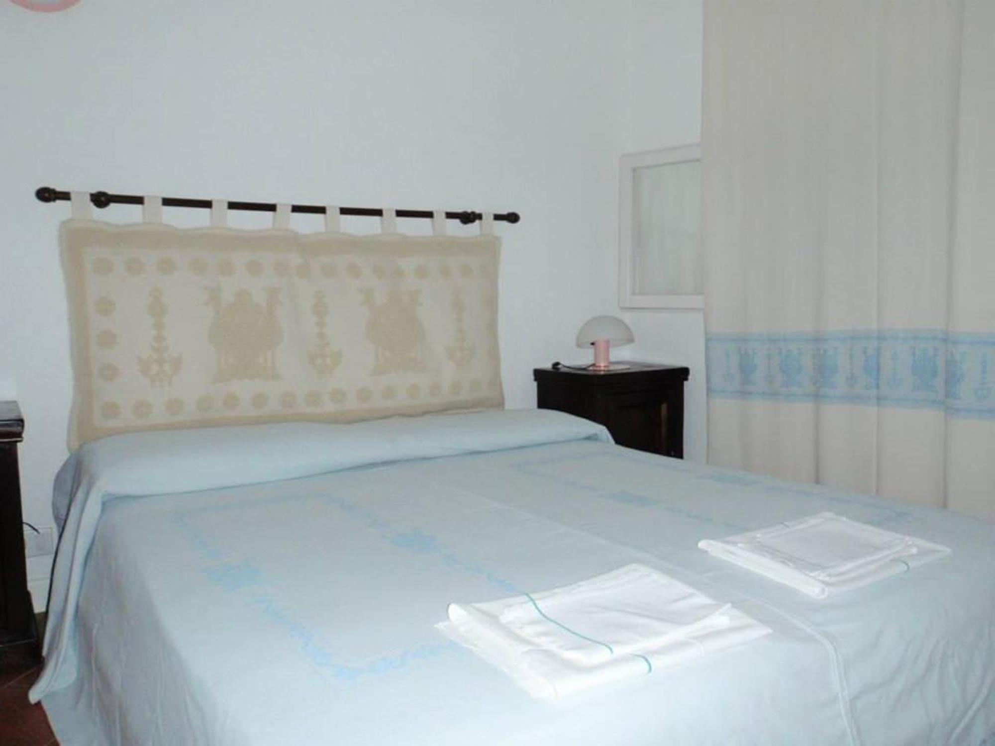 Rocca Ruja Vip Aparthotel Stintino Phòng bức ảnh